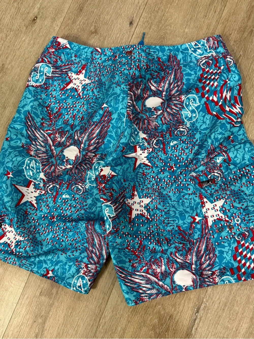 Quiksilver Turquoise & Red Winged Skull Print Swim Trunks